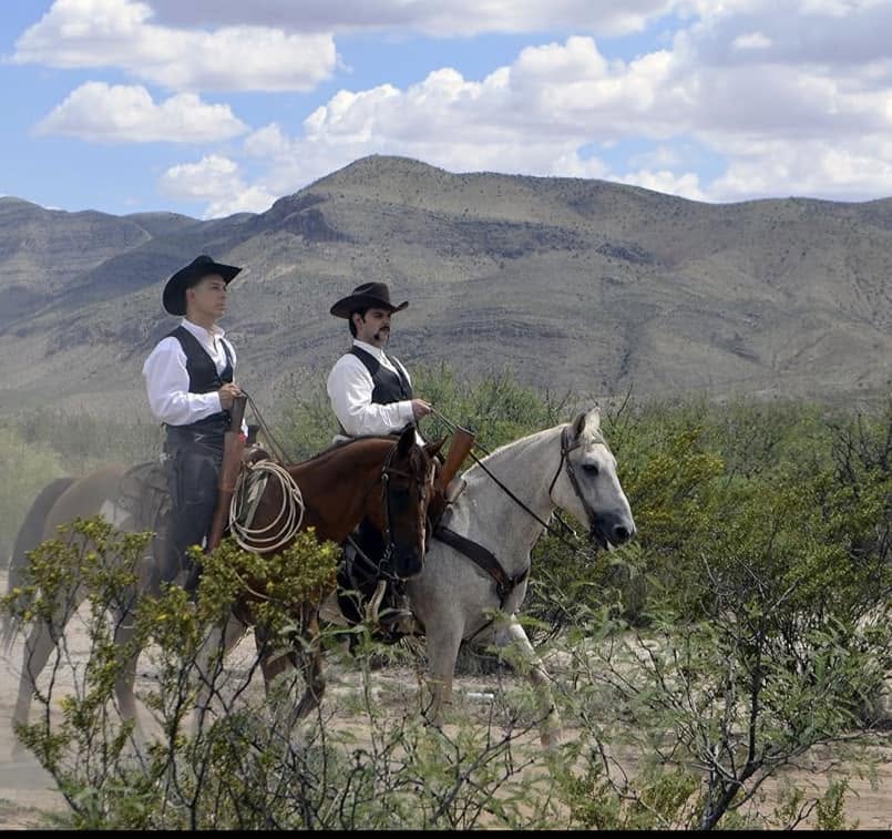 Jay J. Armes III riding a horse in a movie